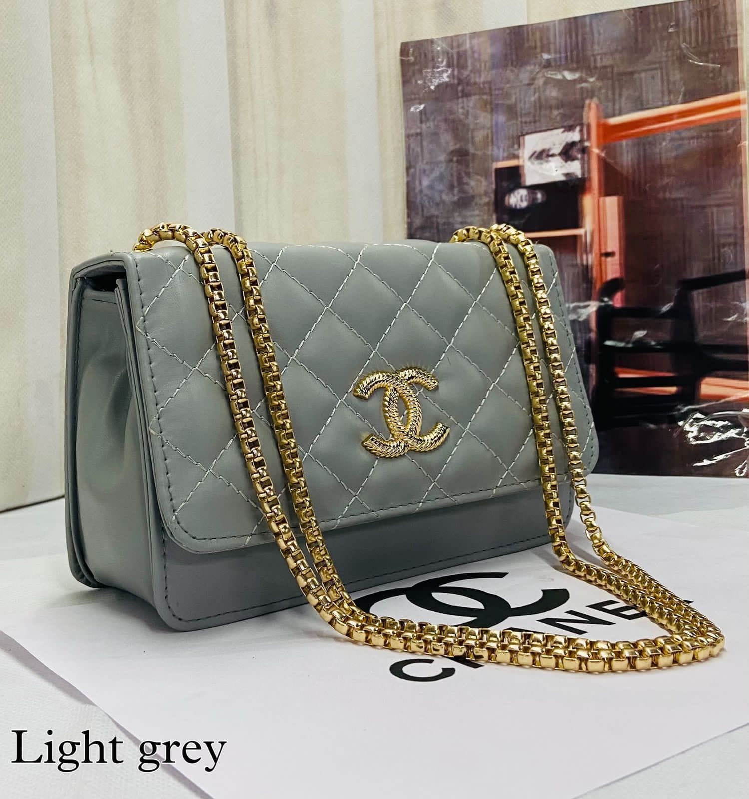 Ethereal Elegance: Chain-Handle Sling Bag with Front Embroidery